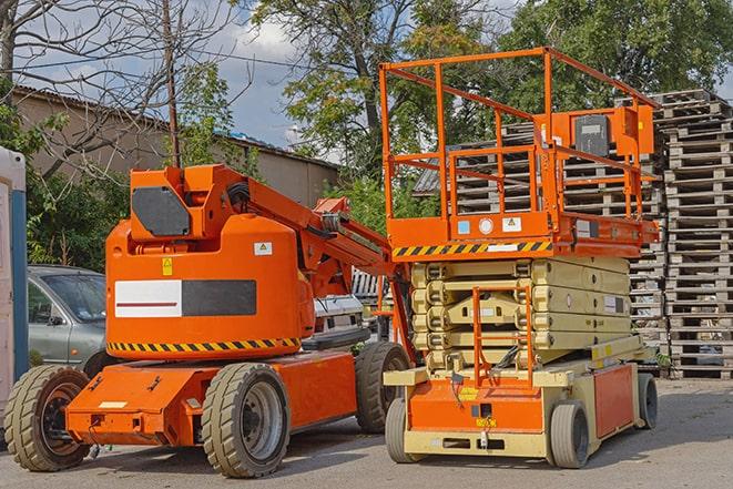 forklift moving crates in a large warehouse in Scotland Neck